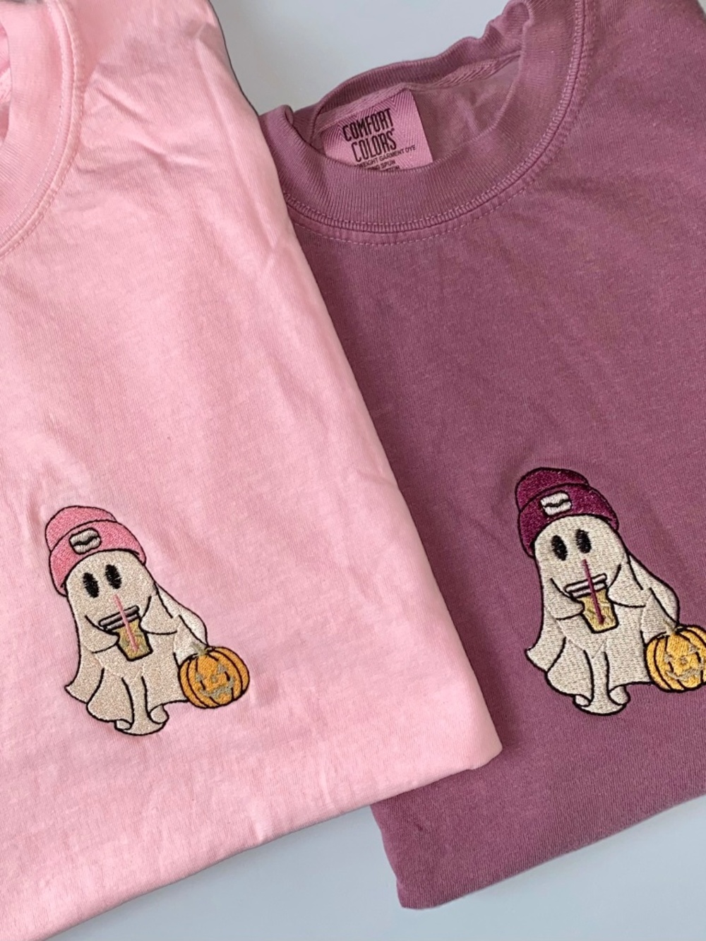 Embroidered ghost drinking iced coffee